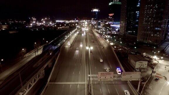 空中夜间高速公路桥下过往车辆