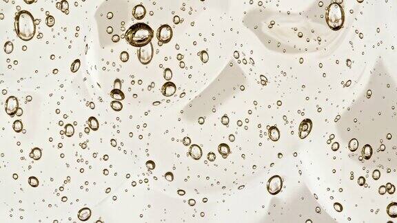 具有分子气泡流动的透明化妆品凝胶液微距镜头