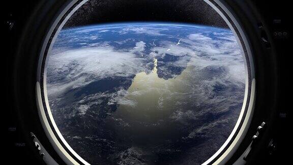 地球通过宇宙飞船的舷窗国际空间站向右移动现实的气氛国际空间站4k