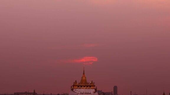 美丽的日落在金山(WatSraketRajavaraviharatemple)曼谷旅游地标泰国;改变运动