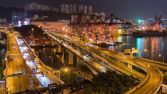 时间流逝夜在香港繁忙的交通过大桥的主要道路城市街道和现代建筑