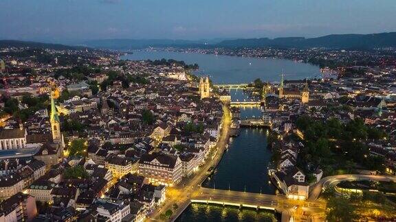 傍晚照明苏黎世中心城市景观河岸航拍全景4k时间流逝瑞士