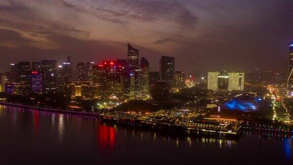 日落天空夜晚照明杭州市区滨江湾空中延时全景4k中国