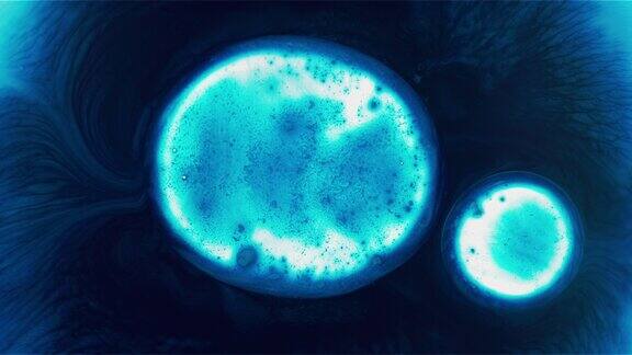 发光的蓝色细胞液滴融合在一起的背景