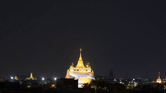 时间流逝的夜晚时间的金山(Watsaket)曼谷的地标;倾斜运动