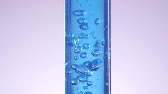 试管内蓝色液态水飞溅气泡