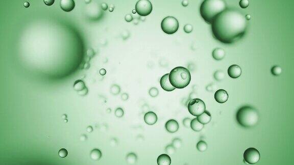 绿色背景上的气泡飞沫