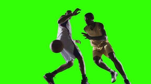篮球运动员在绿色背景上行动
