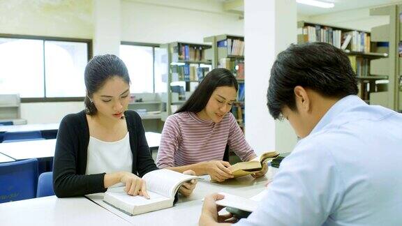 亚洲女学生集中精力看书