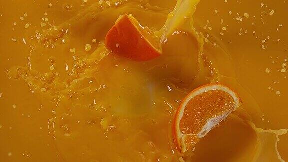 橙柑橘水果落入橙汁4K慢镜头