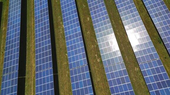 以弧线飞行同时向一个装有太阳能电池板的太阳能农场放大