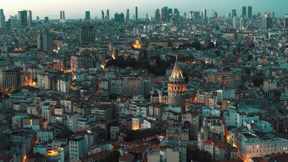 鸟瞰图加拉塔和摩天大楼在晚上伊斯坦布尔-4K无人机镜头