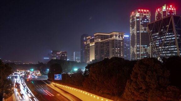 夜景时间照亮了杭州市区交通滨江湾路时光流逝的4k中国全景