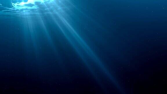 阳光穿过海洋表面从水下看到的景色3D渲染无缝循环动画