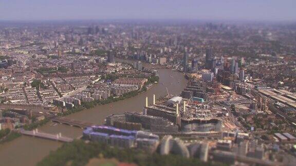 巴特西发电站、泰晤士河和英国伦敦的鸟瞰图带有倾斜位移微缩图像效果4k
