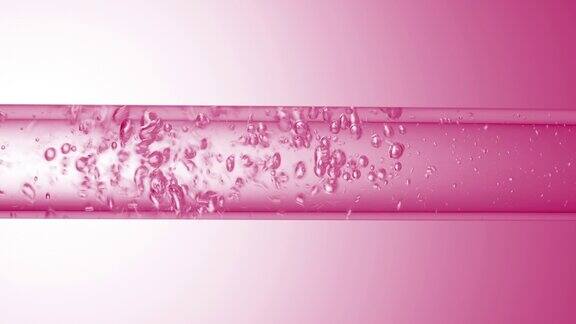 透明液体在玻璃管中流动产生气泡
