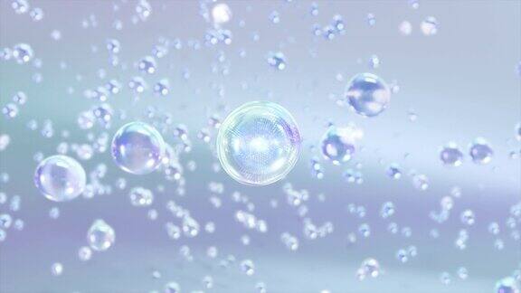 水中的许多液体气泡在浅蓝色背景上特写上升