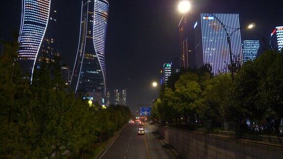 夜景时间照亮了杭州市区交通街道隧道全景4k中国