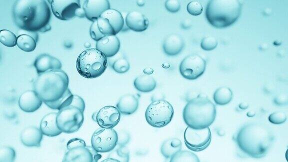 蓝色背景上升起的液体气泡