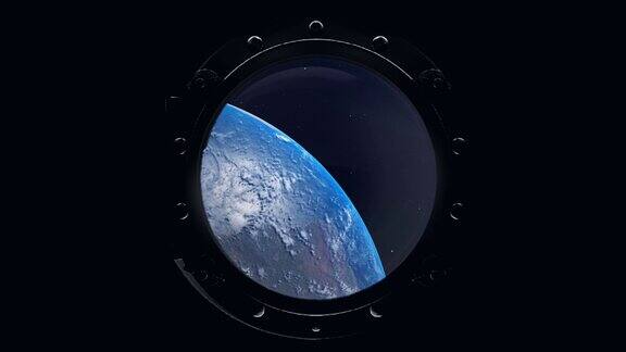 从宇宙飞船的舷窗看到的地球国际空间站绕地球运行太空地球轨道国际空间站
