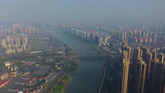 阳光明媚的日落时间长沙城市景观河流交通大桥航拍全景4k中国