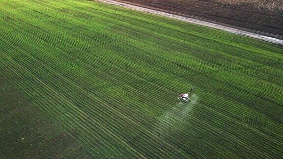 天线农用无人机在田间工作用化学药剂进行田间处理农业部门的创新新技术喷洒杀虫剂消灭害虫精确农业