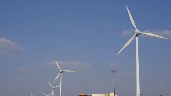 山上的风力发电厂生态电力景观风力涡轮机的清洁能源
