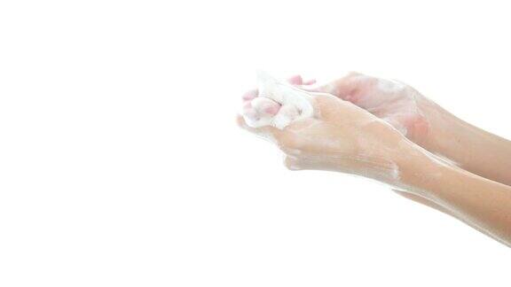 用肥皂洗手隔离在白色背景上以保持手部卫生