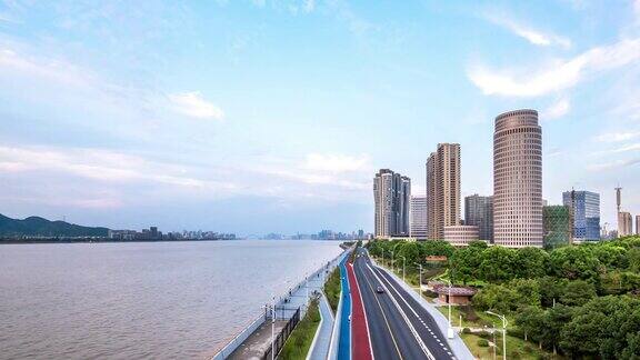 杭州钱塘江附近的现代建筑时间从早到晚