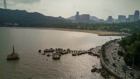 中国日落时间珠海著名渔女纪念碑湾航拍全景4k时间流逝
