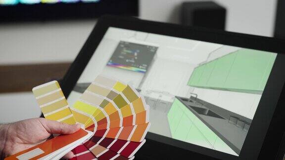 一个专业的平面设计师为室内选择颜色一个人用现代设备为设计师和建筑师工作