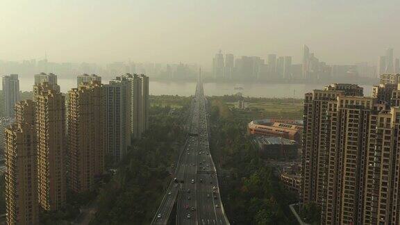 日落时分杭州城市交通街道道路滨江公寓小区航拍全景4k中国