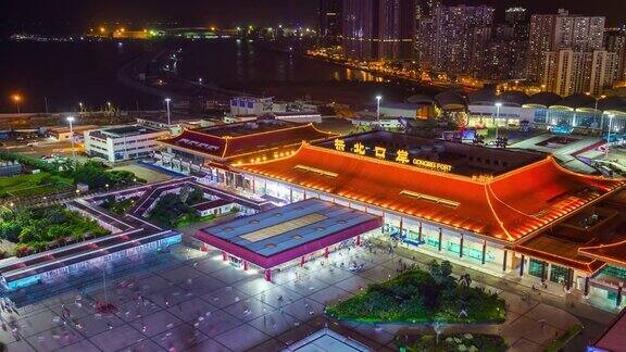 夜光照亮珠海市拱北口岸入口拥挤的广场屋顶全景4k时间流逝中国