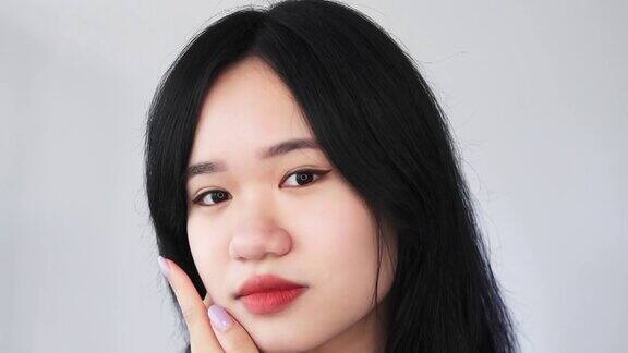 亚洲美容模特面部护理皮肤女性脸