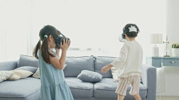 亚洲孩子在家使用360VR头戴式虚拟现实Metaverse兴奋不已