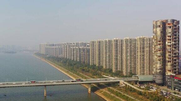 日落时分长沙市现代公寓楼交通大桥江边航拍全景4k中国