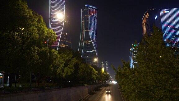 夜景时间照亮杭州市区现代建筑、交通街道、隧道全景4k中国