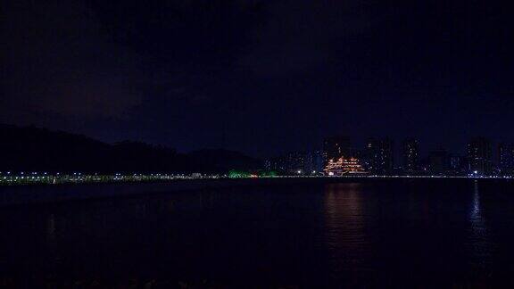 夜晚灯火通明珠海市著名餐饮综合楼全景4k中国