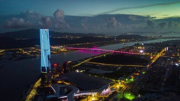 中国日落照亮珠海国际会展中心海湾航拍全景4k时间延时