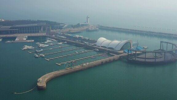 晴天青岛著名的奥林匹克湾港口码头航拍全景4k中国