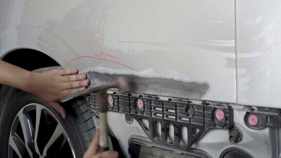 事故后的车身工作是在修理期间为汽车喷漆做准备