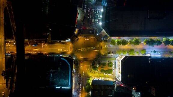中国夜间时间武汉城市交通十字路口环形人行天桥航拍飞行全景4k时间流逝