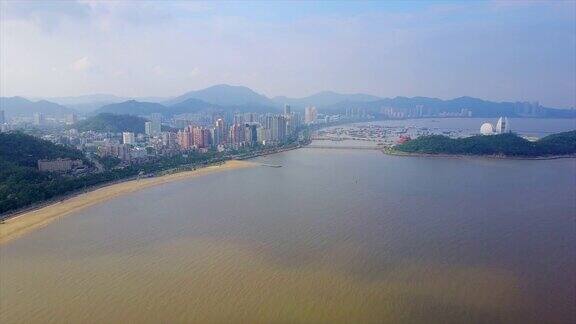 晴天珠海市著名的海滩湾歌剧院岛航拍全景4k中国