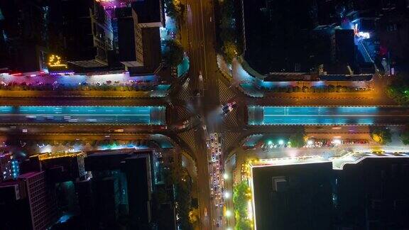 夜间照明长沙市中心交通街道十字路口空中俯仰延时全景4k中国