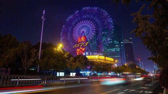 夜景时间照亮长沙市著名摩天轮交通街道全景时间跨度4k中国