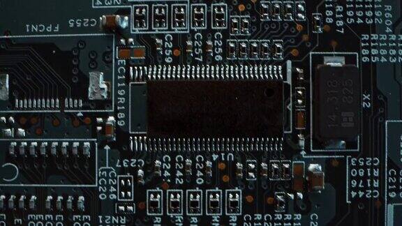 采购产品彩色印刷电路板计算机主板组件:微芯片CPU处理器晶体管半导体电子设备内部超级计算机部分俯视图移动微距拍摄