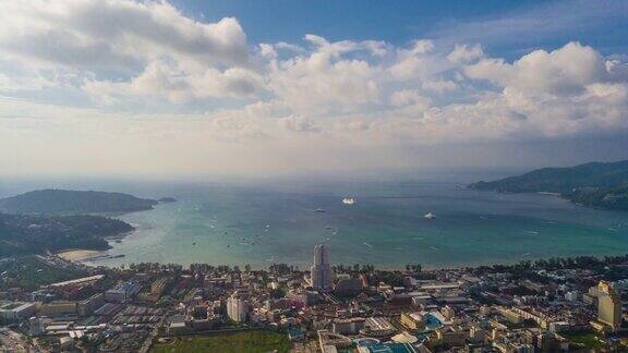 阳光明媚的一天普吉岛巴东海滩小镇空中全景图4k时间推移泰国