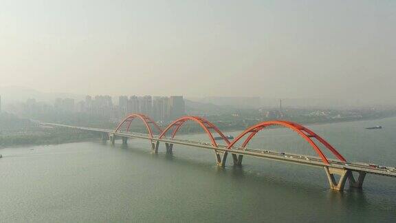 晴朗的傍晚长沙江边著名的交通大桥航拍全景4k中国