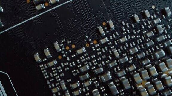 采购产品彩色印刷电路板计算机主板组件:微芯片CPU处理器晶体管半导体电子设备内部超级计算机部分俯视图移动微距拍摄