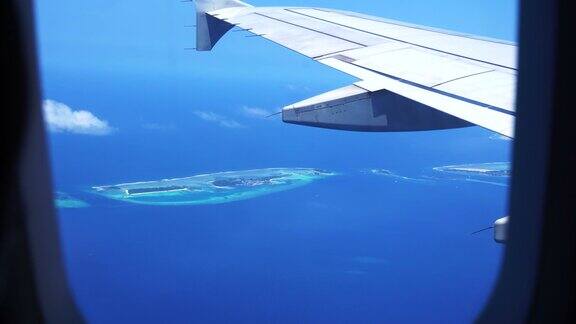 从飞机鸟瞰马尔代夫群岛旅游度假目的地天堂视角4k